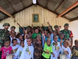 Anak-Anak Kampung Masyeta Antusias Terima Bubur Kacang Hijau Dari Satgas Yonif 642/Kps